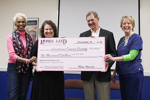 With millions of pink ribbons printed and thousands of dollars raised, the "Homes & Land Cares" campaign in support of the national fight against breast cancer wrapped up Nov. 14 with a final $10,000 corporate donation to the American Cancer Society.